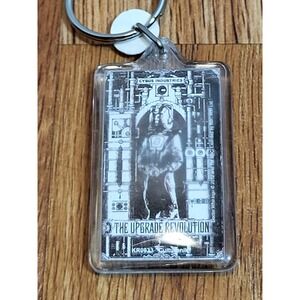 Dr Who Cybus Industries Upgrade Revolution Plastic Keychain